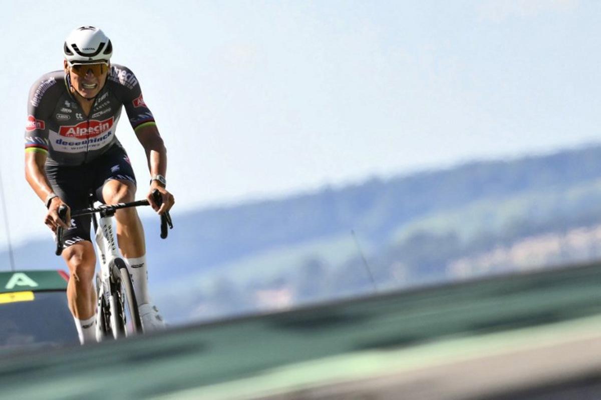 Alpecin - Deceuninck team's Dutch rider Mathieu van der Poel cycles to the finish line of the 6th stage of the 112th edition of the Tour de France cycling race, 201.5 km between Bayeux and Vire Normandie, Northwestern France, on July 10, 2025. Marco BERTORELLO / AFP