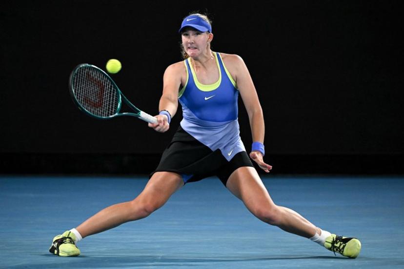 Russia's Mirra Andreeva hits a return to Romania's Elena-Gabriela Ruse during their women's singles match on day six of the Australian Open tennis tournament in Melbourne on January 23, 2026. WILLIAM WEST / AFP
