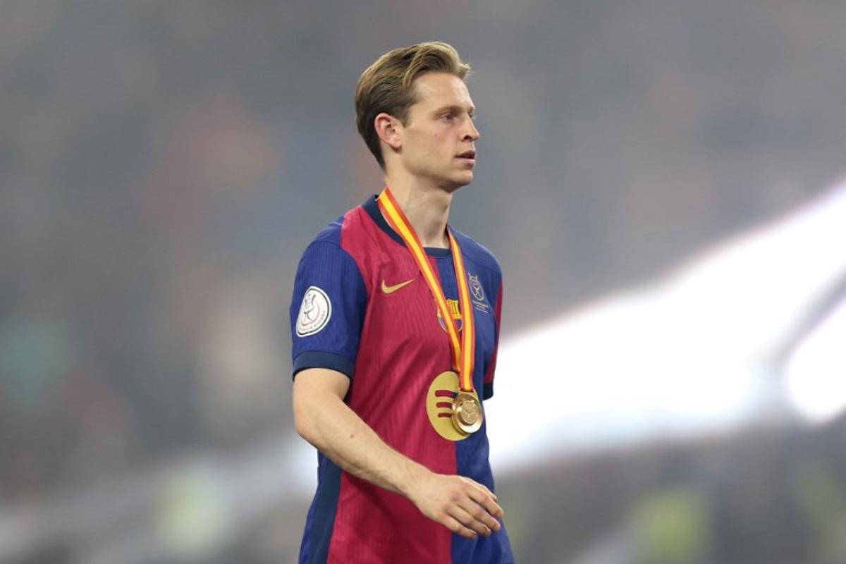 Barcelona's Dutch midfielder #21 Frenkie De Jong walks after receiving his medal at the end of the Spanish Super Cup final football match between Real Madrid and Barcelona at the King Abdullah Sport City in Jeddah on January 12, 2025. Haitham AL-SHUKAIRI / AFP