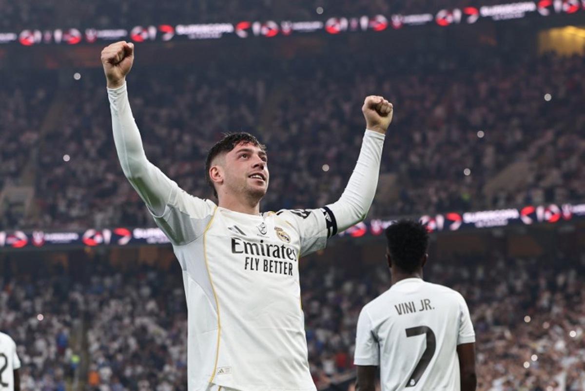 Real Madrid's Uruguayan midfielder #08 Federico Valverde celebrates after scoring his team's first goal during the Spanish Supercup semi-final football match between Atletico Madrid and Real Madrid at King Abdullah Sports City in Jeddah on January 8, 2026. Fadel SENNA / AFP