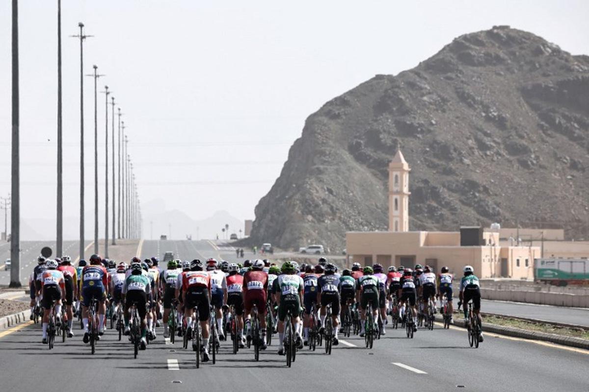 The pack rides during the third stage of the AlUla Tour cycling race, 142.1km from Winter Park to Bir Jaydah Mountain Wirkah on January 29, 2026. Anne-Christine POUJOULAT / AFP