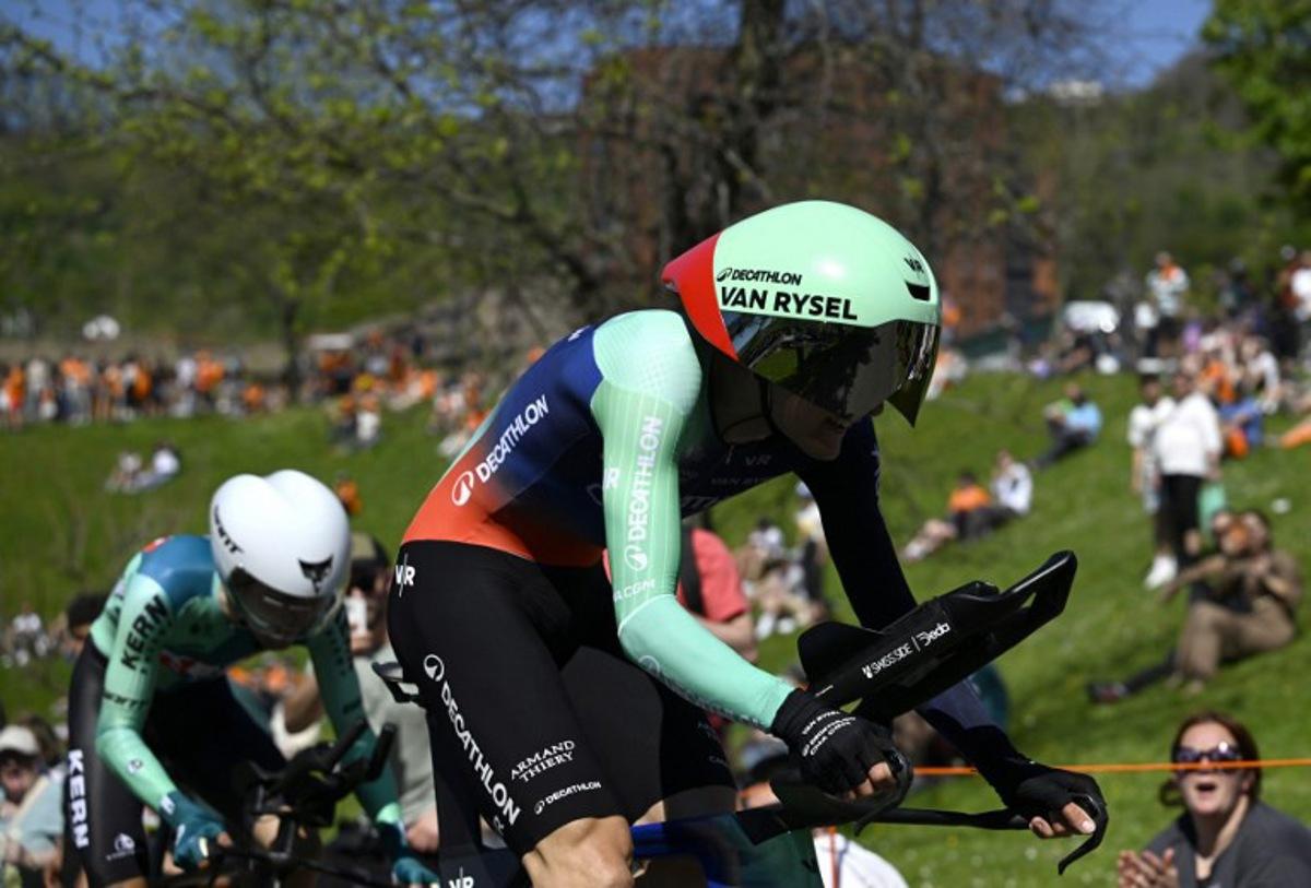 Team Decathlon CMA CGM's French rider Paul Seixas (R) competes ahead of team Decathlon CMA CGM's US rider Matthew Riccitello in the first stage of the Basque Country's Itzulia cycling tour, a 13.8 km time trial in Bilbao on April 6, 2026. ANDER GILLENEA / AFP