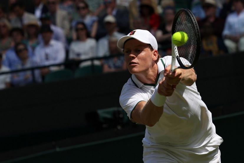 Italy's Jannik Sinner returns to US player Jenson Brooksby during their men's singles third round tennis match on the fifth day of the 2026 Wimbledon Championships at The All England Lawn Tennis and Croquet Club in Wimbledon, southwest London, on July 3, 2026. Adrian Dennis / AFP