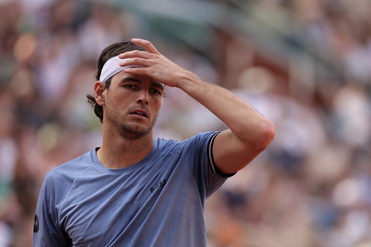 US Taylor Fritz reacts as he plays against US Nishesh Basavareddy during their men's singles match on day 1 of the French Open tennis tournament on Court Suzanne-Lenglen at the Roland-Garros Complex in Paris on May 24, 2026. Thomas SAMSON / AFP