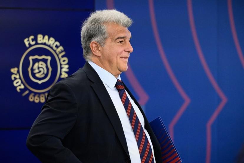 FC Barcelona's President Joan Laporta attends a press conference at the Ciudad Deportiva Joan Gamper in Sant Joan Despi, near Barcelona, on January 14, 2025. Dani Olmo's future at Barcelona remains in the balance as the Catalan club pursue their legal battle to get the midfielder registered to play once more. FC Barcelona's failure to meet La Liga's budgetary rules to license both Olmo and forward Pau Victor before the end of last year currently leaves them ineligible to play for the rest of the season. Josep LAGO / AFP