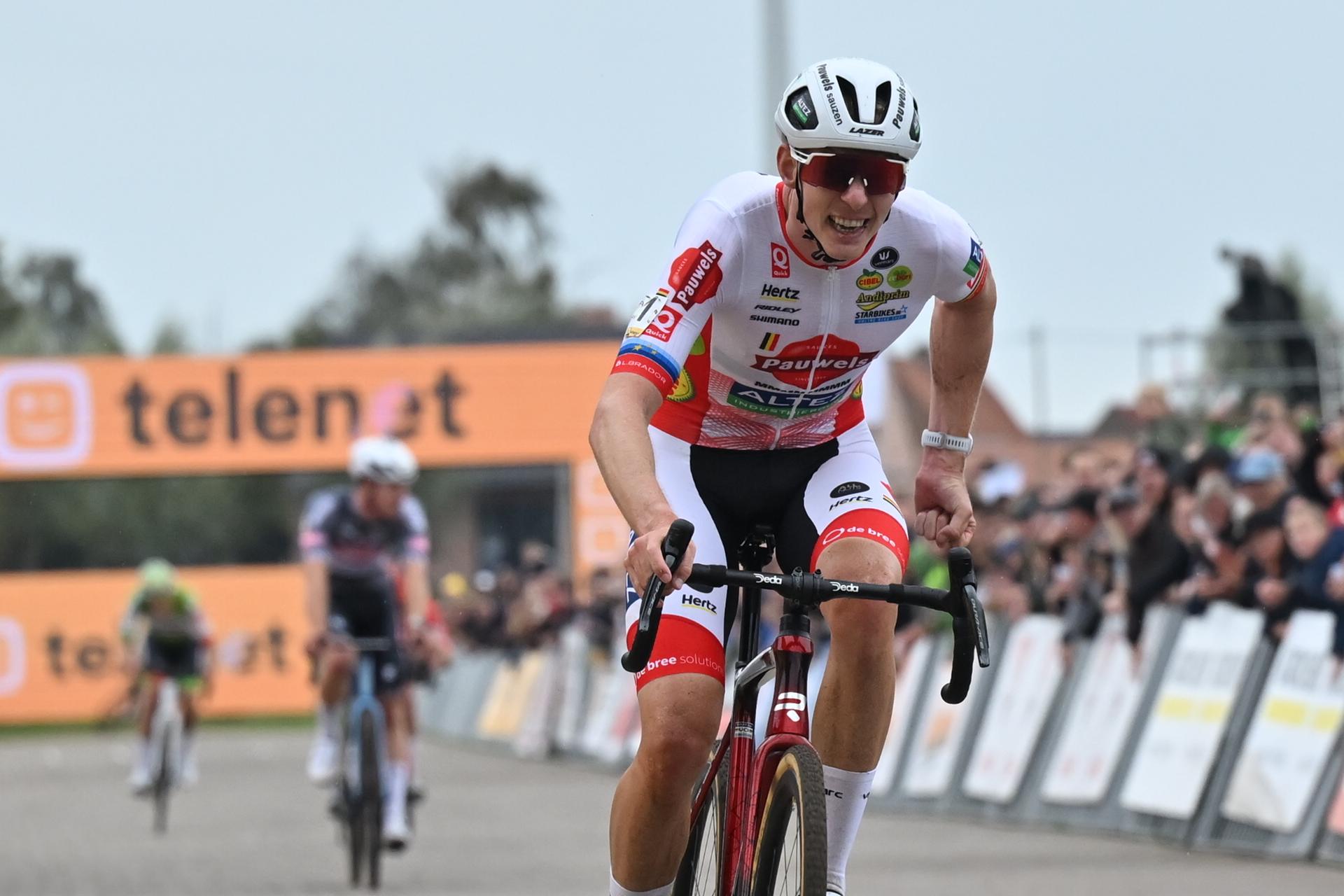Belgian Michael Vanthourenhout celebrates as he crosses the finish line to win the men elite race of the Cyclocross Ruddervoorde, Sunday 19 October 2025 in Ruddervoorde, stage 2 (out of 7) of the Superprestige cyclocross cycling competition. BELGA PHOTO LUC CLAESSEN