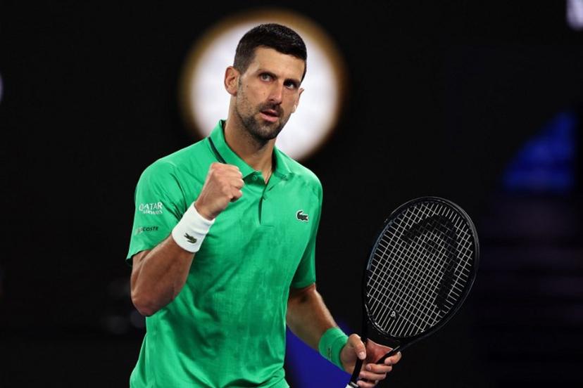 Serbia's Novak Djokovic reacts on a point to Netherlands' Botic van de Zandschulp during their men's singles match on day seven of the Australian Open tennis tournament in Melbourne on January 24, 2026. Martin KEEP / AFP
