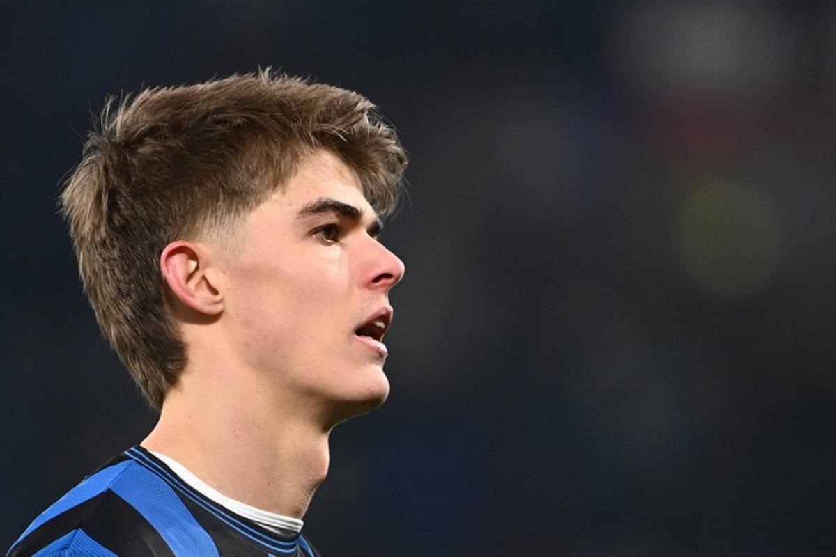 Atalanta's Belgian midfielder #17 Charles De Ketelaere reacts at the end of the UEFA Champions League knockout phase play-off 2nd leg football match between Club Brugge KV and Atalanta at the Stadio di Bergamo in Bergamo on February 18, 2025. Isabella BONOTTO / AFP