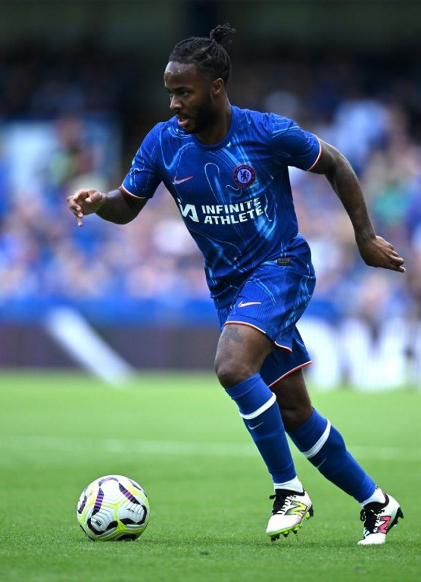 Chelsea's English midfielder #07 Raheem Sterling runs with the ball during the pre-season friendly football match between Chelsea and Inter Milan at the Stamford Bridge stadium in London on August 11, 2024. JUSTIN TALLIS / AFP