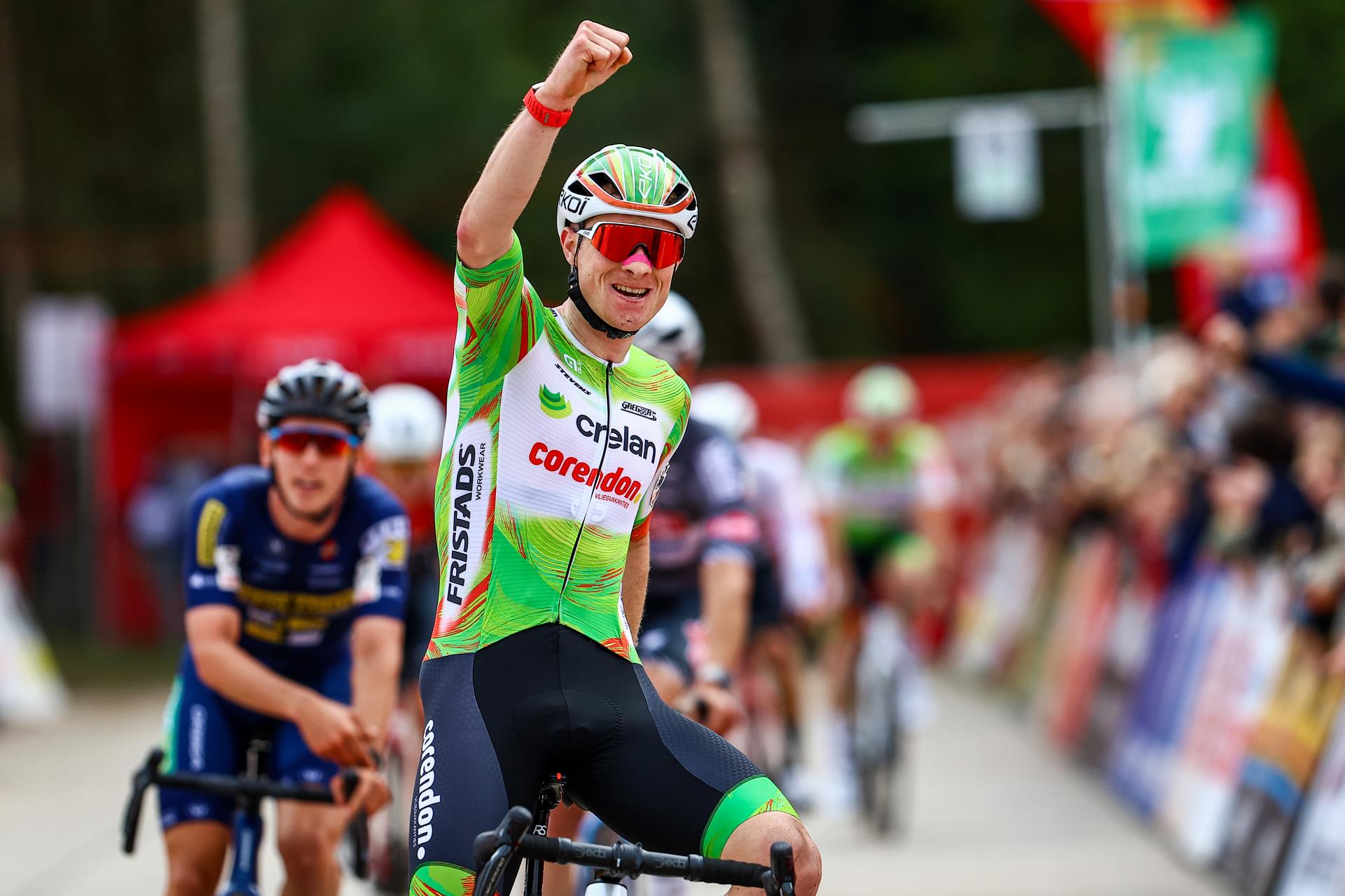 Belgian Toon Vandebosch celebrates as he crosses the finish line to win the men's elite race of the Exact Cross Essen, stage 2 (out of 7) in the Exact Cross cyclocross competition, Saturday 18 October 2025, in Essen. BELGA PHOTO DAVID PINTENS