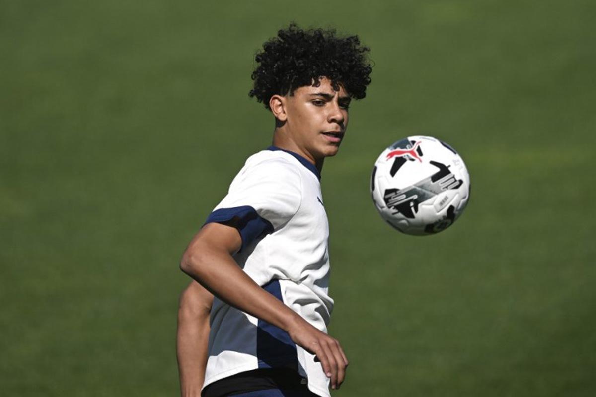 Portugal's under 15 forward Cristiano dos Santos Junior "Cristianinho", son of Portugal's forward Cristiano Ronaldo, takes part in a training session at Cidade do Futebol, training camp in Oeiras, outskirts of Lisbon, on May 11, 2025, ahead of under 15 Portugal vs Japan match on May 13, 2025 during Vlatko Markovic International Tournament in Croatia. PATRICIA DE MELO MOREIRA / AFP