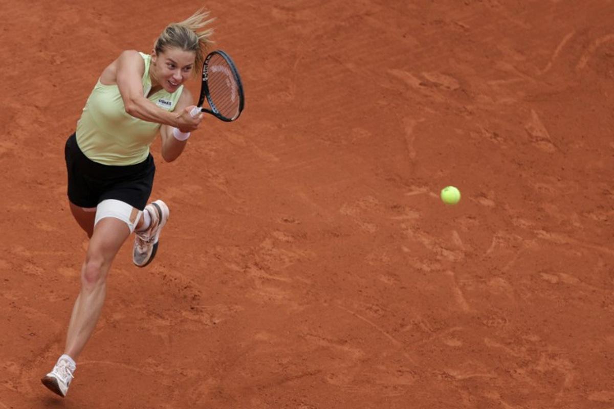 Poland's Maja Chwalinska plays a backhand return to Anna Kalinskaya during their women's quarter final singles match on day 11 of the French Open tennis tournament on Court Philippe-Chatrier at the Roland-Garros Complex in Paris on June 3, 2026. Thomas SAMSON / AFP
