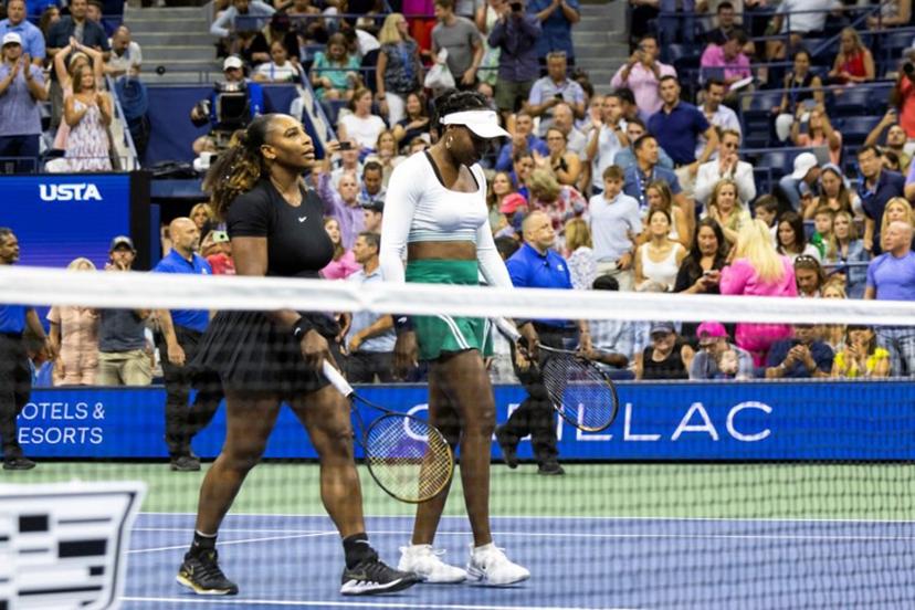 USA's Serena Williams (L) and Venus Williams leave the court after their loss against Czech Republic's Lucie Hradecka and Linda Noskova during their 2022 US Open Tennis tournament women's doubles first round match at the USTA Billie Jean King National Tennis Center in New York, on September 1, 2022. COREY SIPKIN / AFP