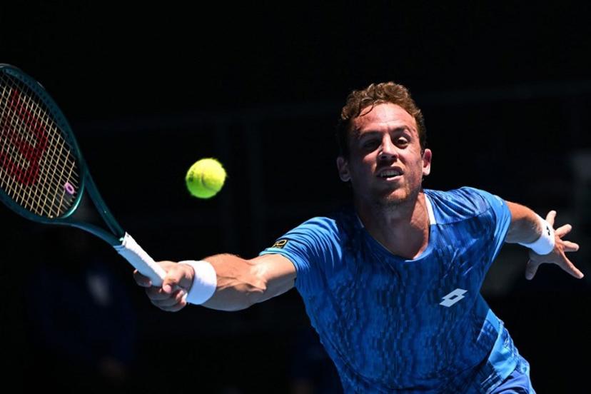 Spain's Roberto Carballes Baena hits a return against USA's Tommy Paul during their men's singles match on day six of the Australian Open tennis tournament in Melbourne on January 17, 2025. WILLIAM WEST / AFP