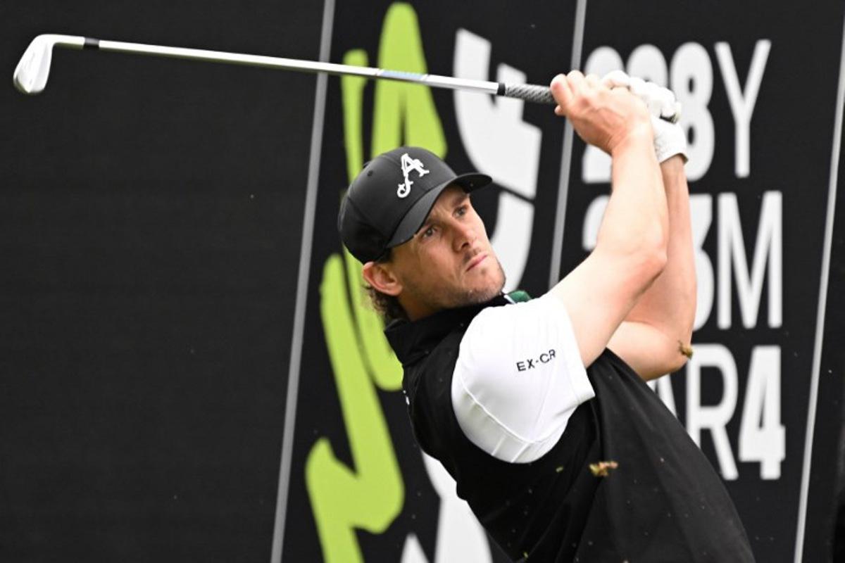 LIV team 4ACES GC player Thomas Pieters of Belgium tees off on day one of the LIV Golf tournament at Fanling golf club in Hong Kong on March 7, 2025. Peter PARKS / AFP