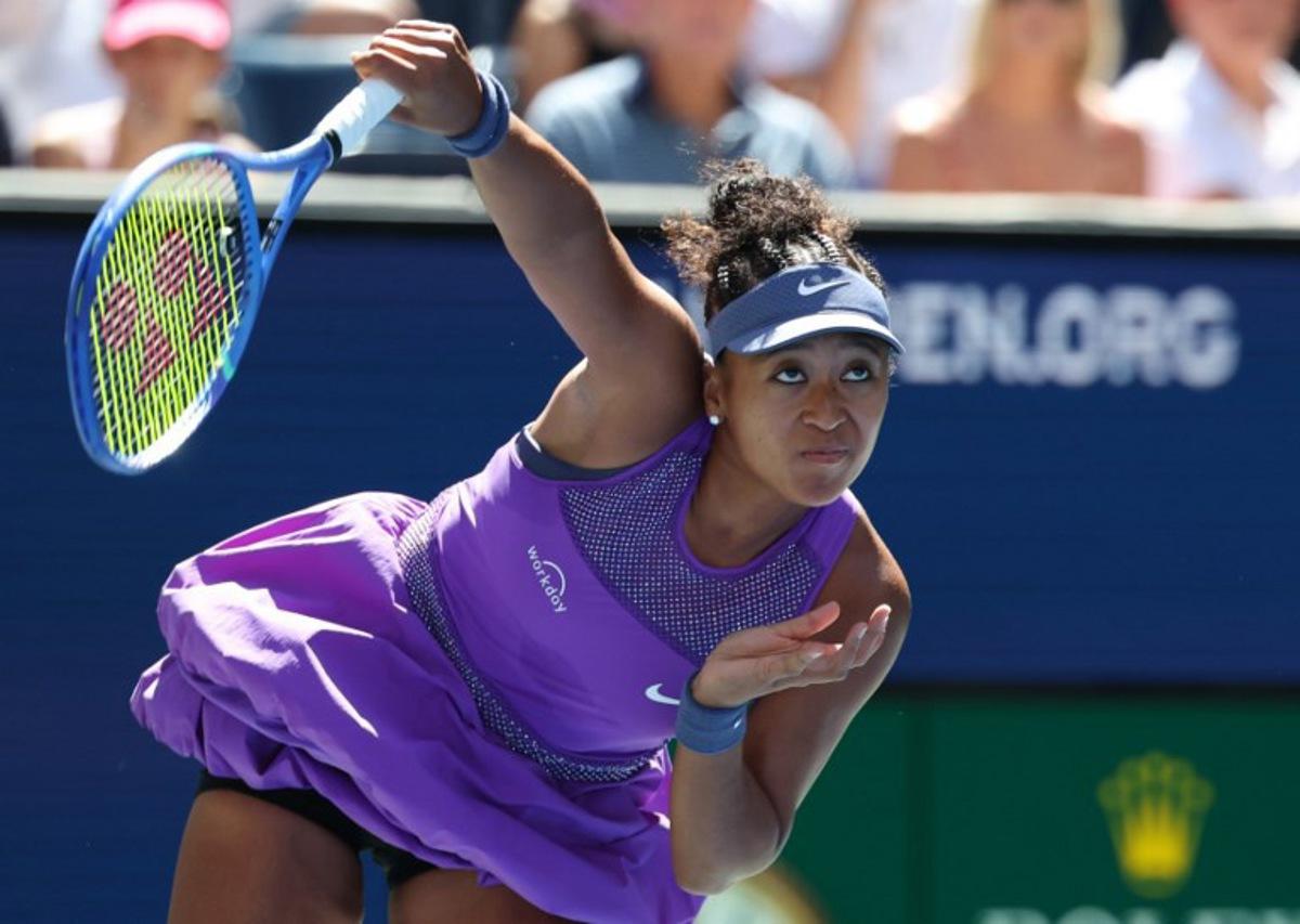 Japan's Naomi Osaka serves to Australia's Daria Kasatkina during their women's singles third round match on day seven of the US Open tennis tournament at the USTA Billie Jean King National Tennis Center in New York City, on August 30, 2025. TIMOTHY A. CLARY / AFP