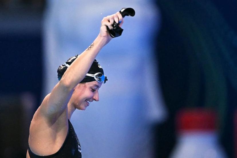 US' swimmer Kate Douglass celebrates after the final of the women's 200m breaststroke swimming event during the 2025 World Aquatics Championships in Singapore on August 1, 2025. MANAN VATSYAYANA / AFP