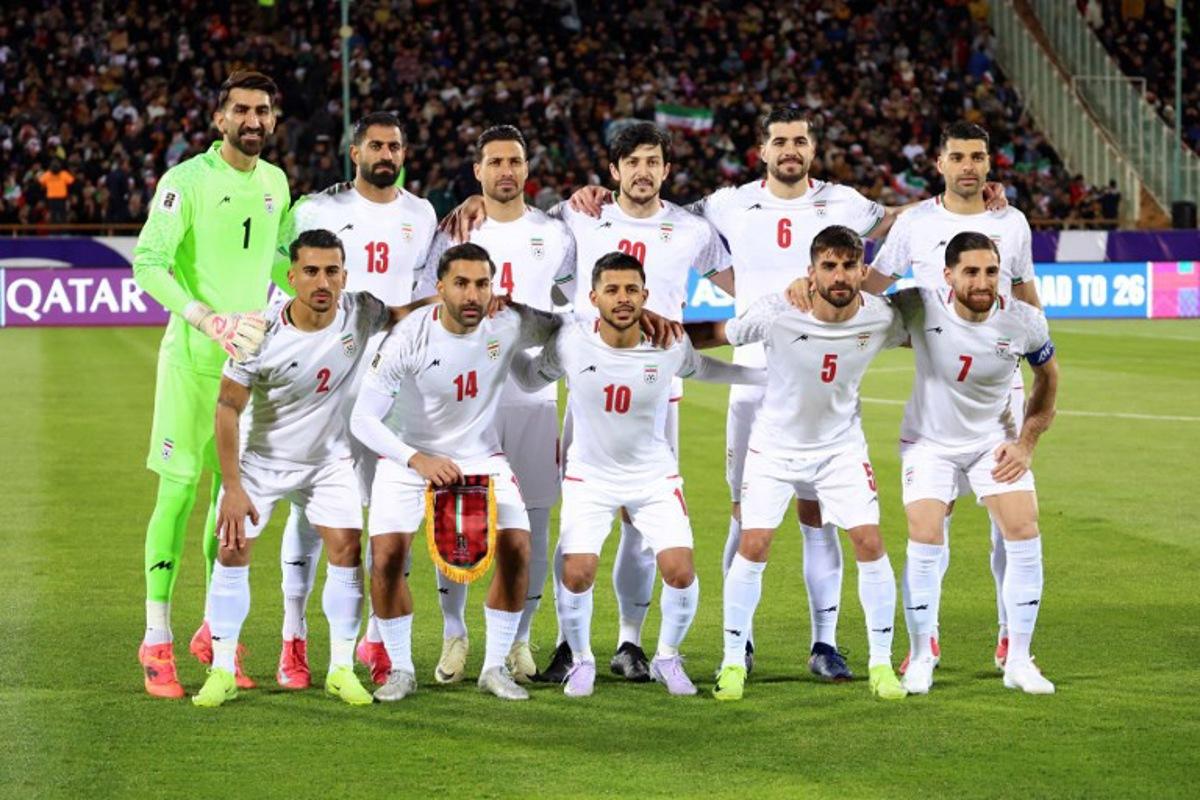 Iran's national footbal team pose for a group picture before the FIFA World Cup 2026 Asia zone qualifiers group A football match between Iran and Uzbekistan, on March 25, 2025 in Tehran. AFP