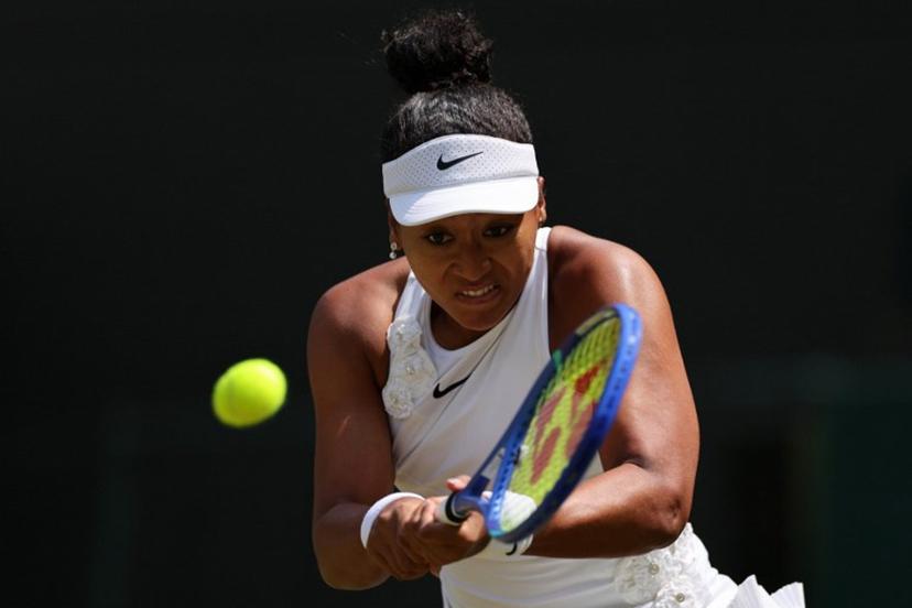 Japan's Naomi Osaka returns to Australia's Daria Kasatkina during their women's singles third round tennis match on the fifth day of the 2026 Wimbledon Championships at The All England Lawn Tennis and Croquet Club in Wimbledon, southwest London, on July 3, 2026. Adrian DENNIS / AFP