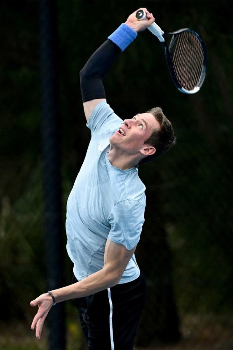 Belgium's Kimmer Coppejans serves during a practice session ahead of the United Cup tennis tournament in Sydney on January 2, 2026. Saeed KHAN / AFP