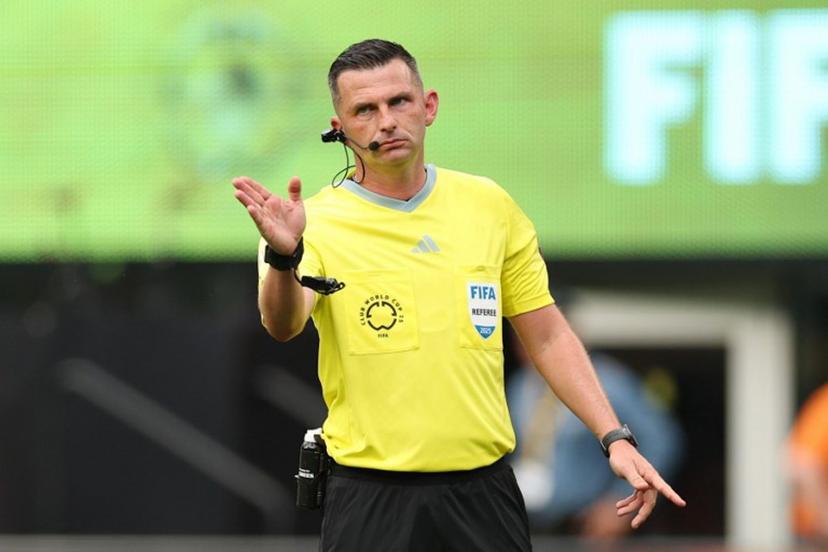 English referee Michael Oliver gestures during the FIFA Club World Cup 2025 Group F football match between Brazil's Fluminense and South Korea's Ulsan HD at the MetLife stadium in East Rutherford, New Jersey on June 21, 2025. CHARLY TRIBALLEAU / AFP
