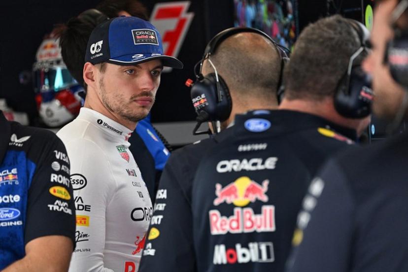 Red Bull Racing's Dutch driver Max Verstappen (L) is pictured in the garage before the qualifying session ahead of the Formula One British Grand Prix at the Silverstone motor racing circuit in Silverstone, central England, on July 4, 2026. PETER POWELL / POOL / AFP