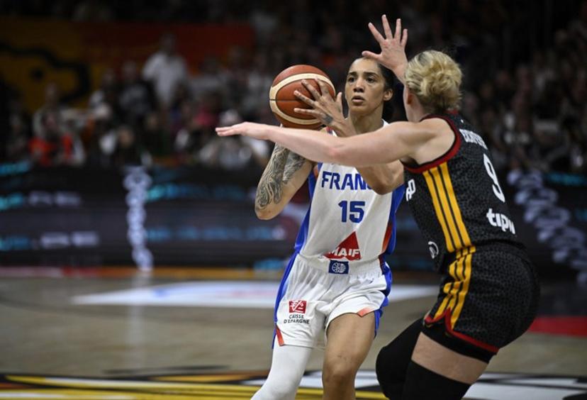 France's forward #15 Gabby Williams (L) and Germany's small forward #09 Emma Eichmeyer vie for the ball during the 2026 FIBA Women's Basketball World Cup semi-final match between France and Germany in Berlin on September 12, 2026. Tobias SCHWARZ / AFP