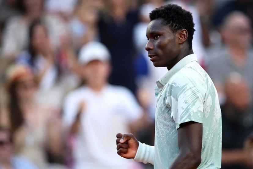France's Moise Kouame reacts to a point against Chile's Alejandro Tabilo during their men's singles match on day 7 of the French Open tennis tournament on Court Suzanne-Lenglen at the Roland-Garros Complex in Paris on May 30, 2026. Anne-Christine POUJOULAT / AFP