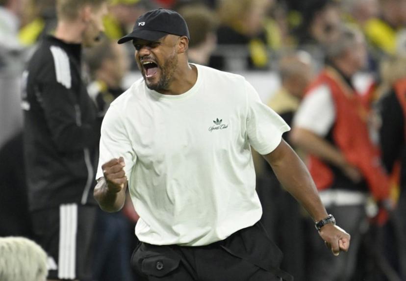 Bayern Munich's Belgian head coach Vincent Kompany celebrates after his team scored the 0-2 goal during the Franz Beckenbauer Supercup football match between Borussia Dortmund and FC Bayern Munich on August 22, 2026 in Dortmund, western Germany. INA FASSBENDER / AFP