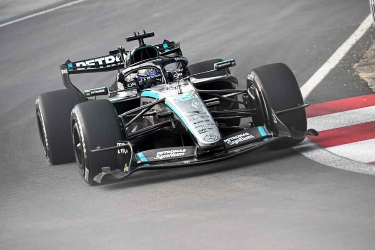 Mercedes' British driver George Russell drives during a practice session ahead of the Formula One Singapore Grand Prix at the Marina Bay Street Circuit in Singapore on October 9, 2026. Lillian SUWANRUMPHA / AFP