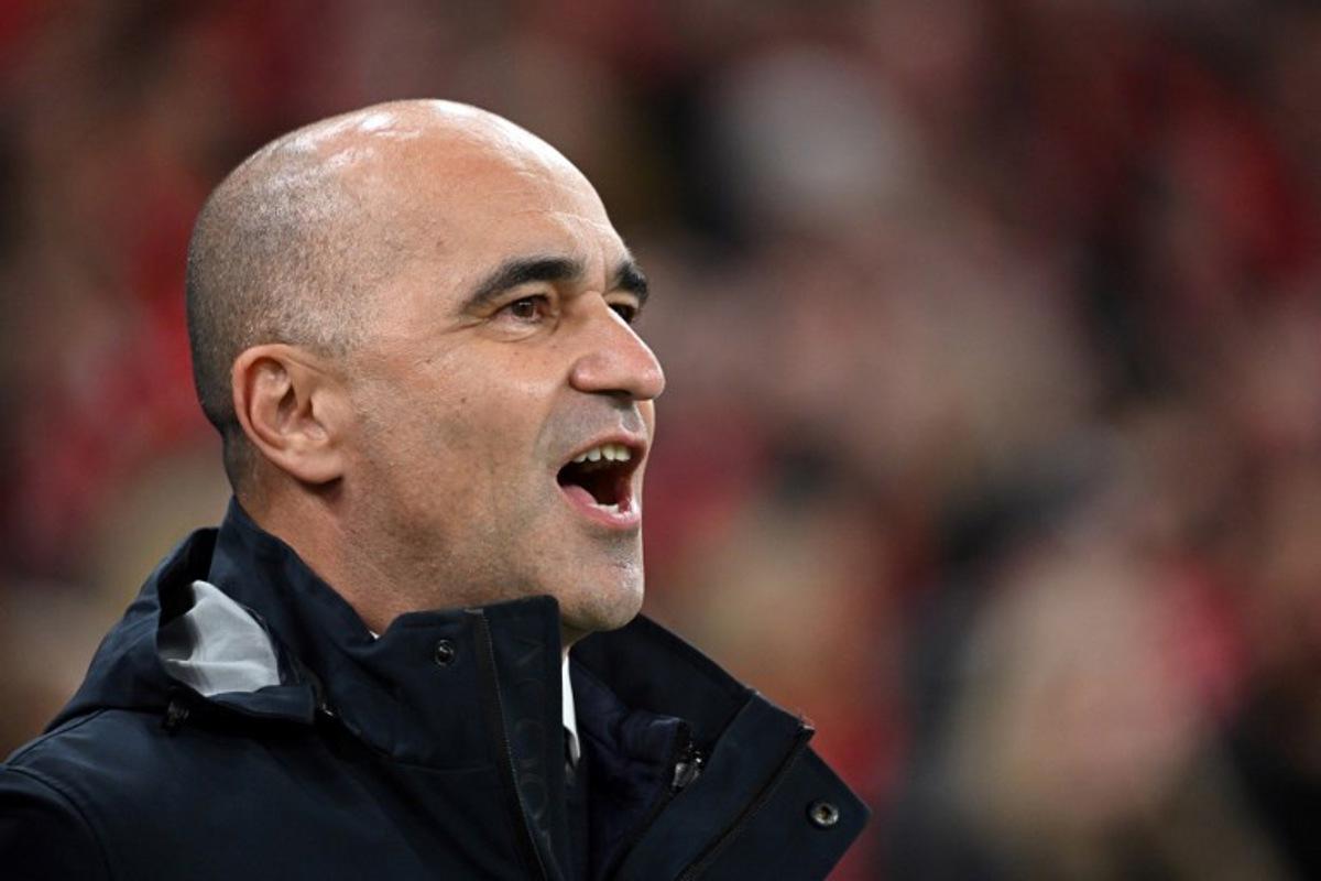 Portugal's Spanish head coach Roberto Martinez reacts during the UEFA Nations League quarter-final, first-leg football match Denmark v Portugal at the Parken Stadium in Copenhagen on March 20, 2025. Jonathan NACKSTRAND / AFP
