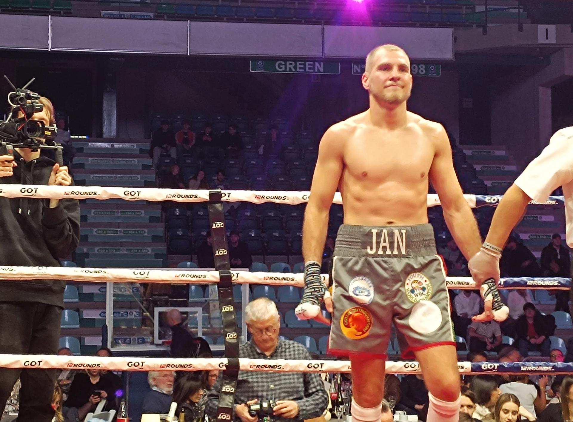 Belgian Jan Helin celebrates after winning the European Silver EBU title in the super-welterweights category during a fight in Mons, Saturday 14 December 2024. BELGA PHOTO BERNARD CERF