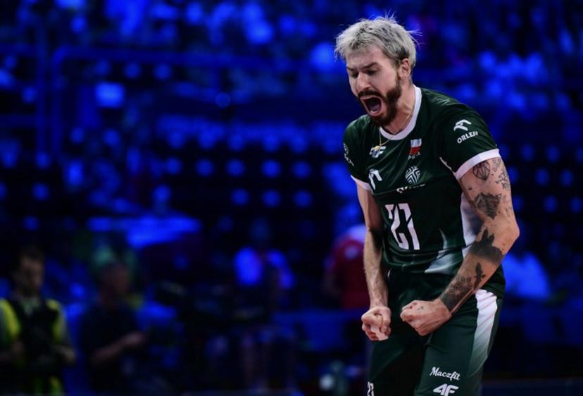 Poland's Opposite Hitter #21 Tomasz Fornal celebrates a point during the CEV EuroVolley 2026 men's semifinal volleyball match between Poland and Slovenia at the Forum of Assago, on September 25, 2026. Marco BERTORELLO / AFP