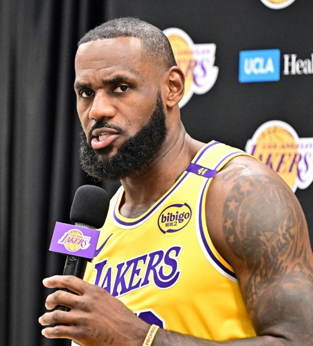 Los Angeles Lakers #23 LeBron James speaks to the press during the Lakers media day at UCLA Health Training Center in El Segundo, California, September 30, 2024. Frederic J. BROWN / AFP