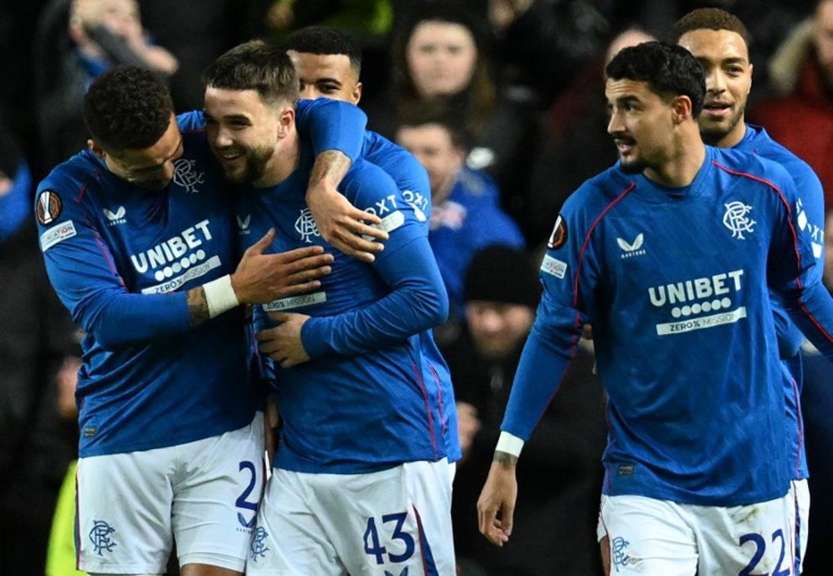 Rangers' Belgian midfielder #43 Nicolas Raskin (2L) celebrates scoring the opening goal during the UEFA Europa League football match between Rangers and Royale Union Saint-Gilloise at the Ibrox Stadium in Glasgow on January 30, 2025. ANDY BUCHANAN / AFP