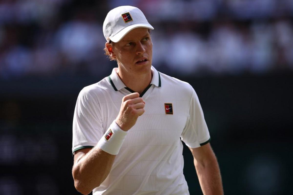 Italy's Jannik Sinner reacts against Serbia's Novak Djokovic during their men's singles semi-final tennis match on the twelfth day of the 2026 Wimbledon Championships at The All England Lawn Tennis and Croquet Club in Wimbledon, southwest London, on July 10, 2026. HENRY NICHOLLS / AFP