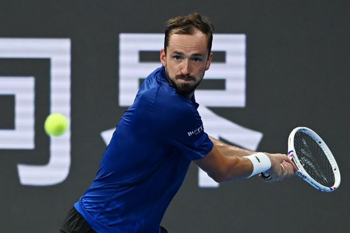 Russia's Daniil Medvedev hits a return to Russia's Roman Safiullin during their men's singles semi-final match at the Hangzhou Open tennis tournament in Hangzhou, in China's eastern Zhejiang province on September 28, 2026. AFP