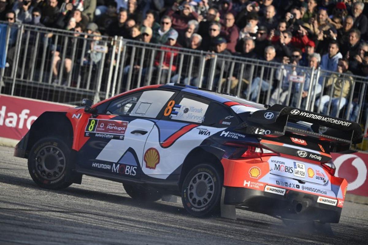 Ott Tanak of Estonia and his co-driver Martin Jarveoja of Estonia compete in their Hyundai i20 N Rally 1 during the SS1 stage of the World Rally Championship (WRC) Rally of Portugal in Figueira da Foz, on May 15, 2025. MIGUEL RIOPA / AFP