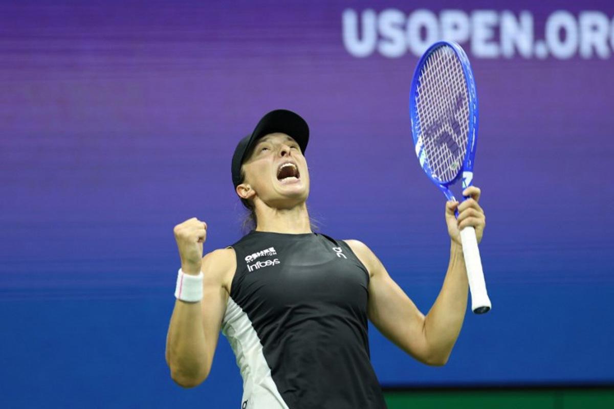 Poland's Iga Swiatek celebrates her victory over Russia's Anna Kalinskaya during their women's singles third round match on day seven of the US Open tennis tournament at the USTA Billie Jean King National Tennis Center in New York City, on August 30, 2025. CHARLY TRIBALLEAU / AFP