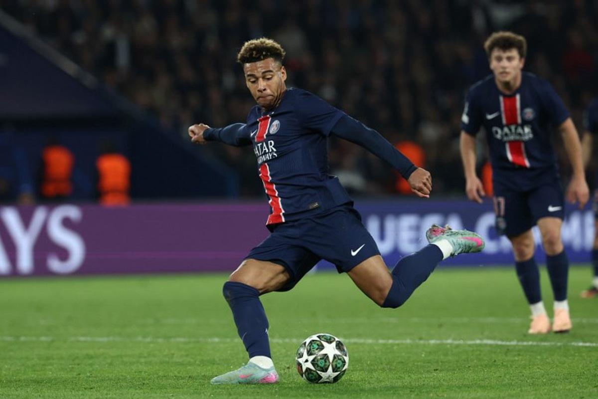 Paris Saint-Germain's French midfielder #14 Desire Doue shoots the ball during the UEFA Champions League Quarter final first leg football match between Paris Saint-Germain (FRA) and Aston Villa (ENG) at the Parc des Princes stadium in Paris on April 9, 2025. FRANCK FIFE / AFP