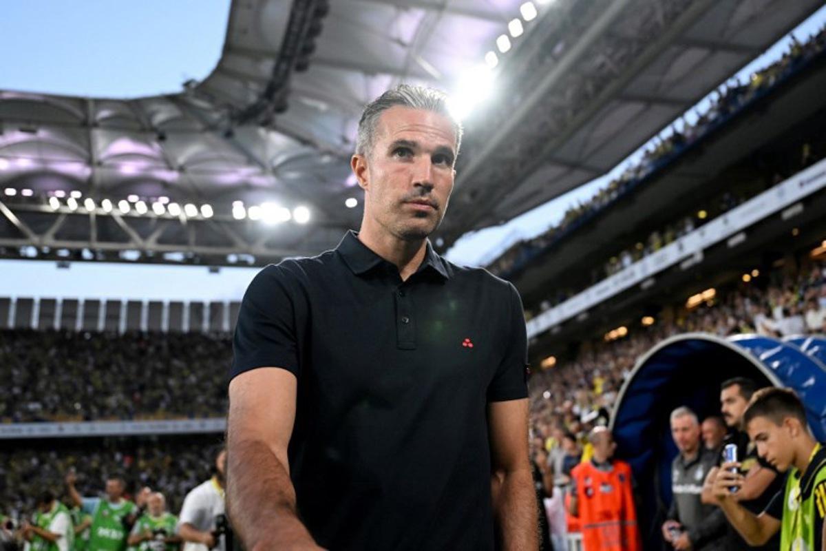 Feyenoord's Dutch head coach Robin Van Persie looks on during the UEFA Champions League 3rd round second leg football match between Fenerbahce (TUR) and Feyenoord (NED) at the Fenerbahçe Sükrü Saracoglu Sport Complex in Istanbul on August 12, 2025. Ozan KOSE / AFP