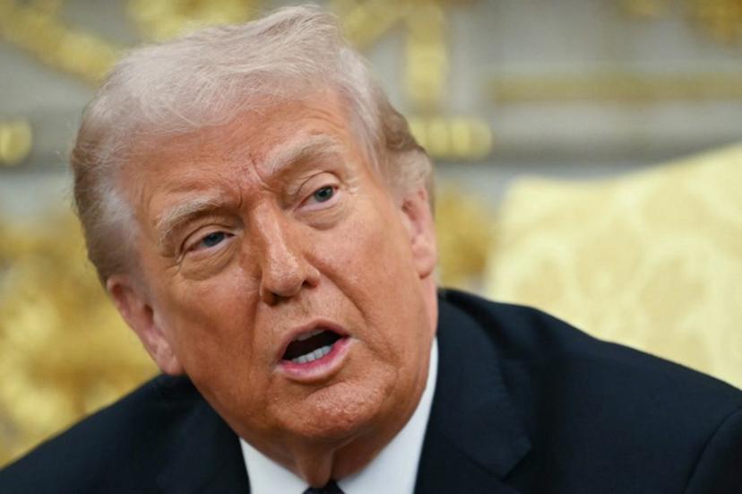 US President Donald Trump speaks during a meeting with German Chancellor Friedrich Merz in the Oval Office of the White House in Washington, DC on March 3, 2026. Chancellor Merz is the first European leader to visit President Trump since the United States and Israel launched their war against Iran. ANDREW CABALLERO-REYNOLDS / AFP