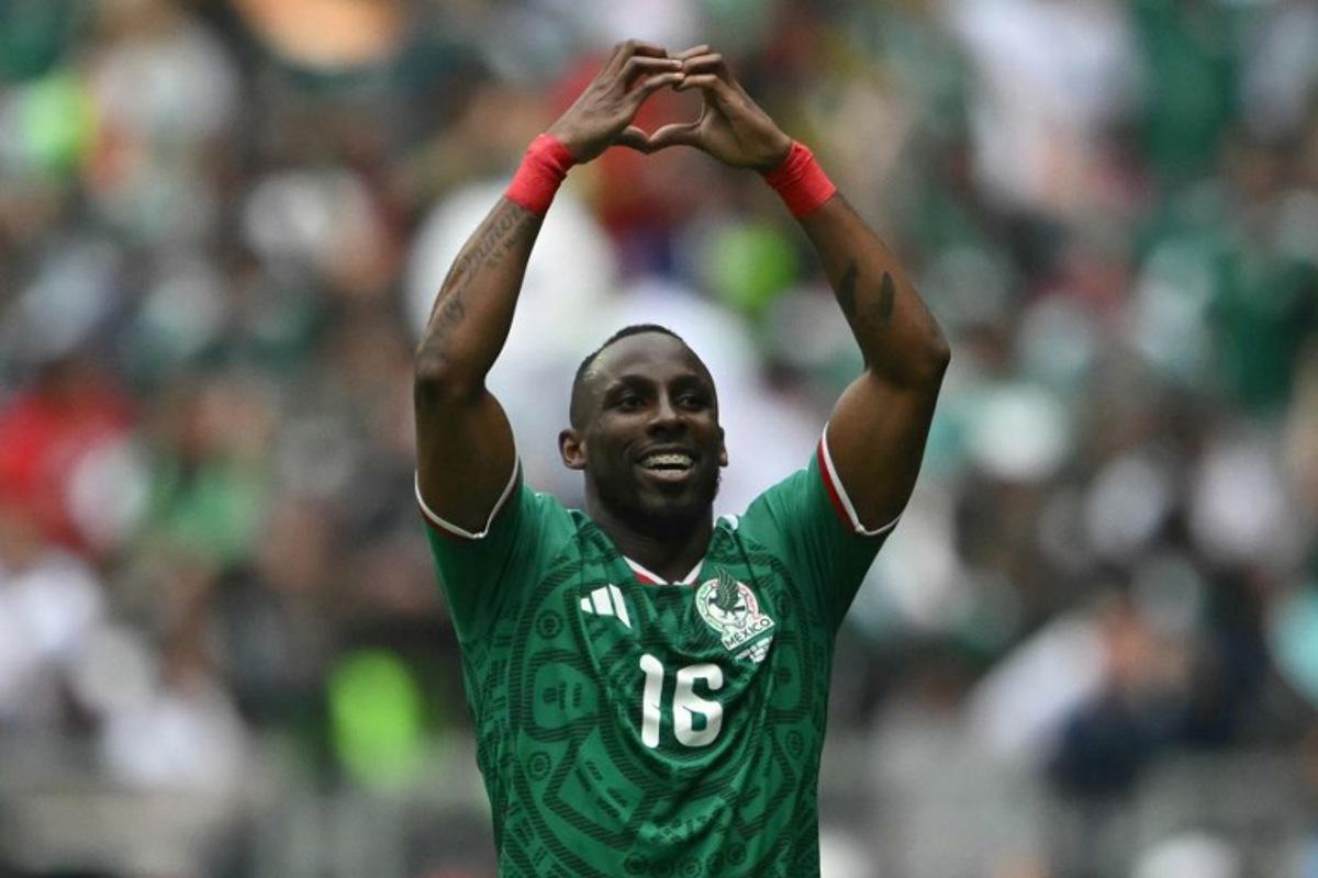 Mexico's forward #16 Julian Quinones celebrates scoring his team's first goal during the 2026 World Cup Group A football match between Mexico and South Africa at the Mexico City Stadium in Mexico City on June 11, 2026. CARL DE SOUZA / AFP