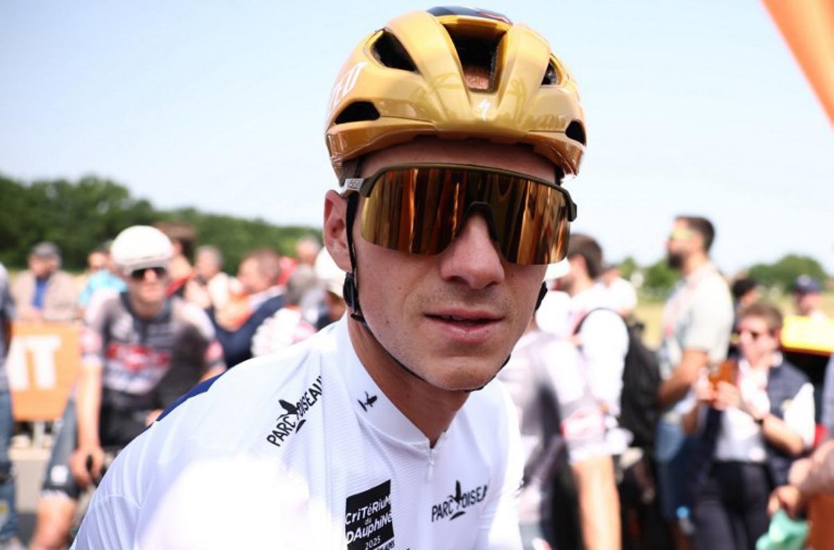 Soudal Quick-Step's Belgian rider Remco Evenepoel wearing the best young rider's white jersey reacts prior to the 2nd stage of the 77th edition of the Criterium du Dauphine cycling race, 204,6 km between Prémilhat and Issoire, on June 9, 2025. Anne-Christine POUJOULAT / AFP