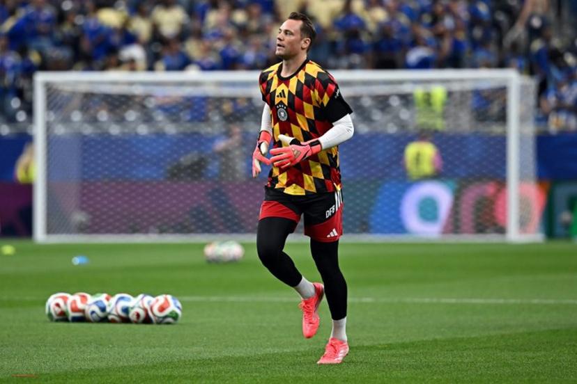 Germany's goalkeeper #01 Manuel Neuer takes part in the warm-up ahead of the 2026 World Cup Group E football match between Germany and Curacao at the Houston Stadium in Houston on June 14, 2026. Paul ELLIS / AFP