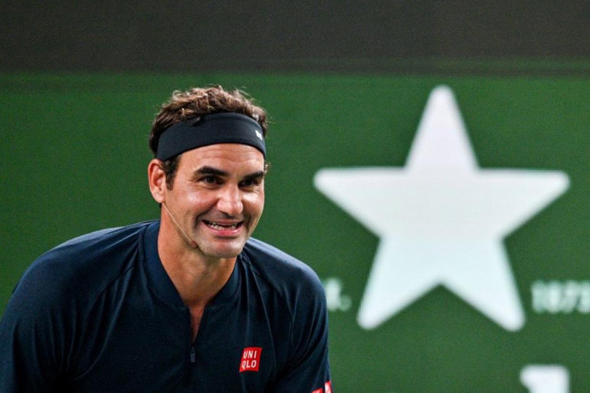 Swiss Roger Federer participates in the exhibition event Roger and friends celebrity doubles match at the Shanghai Masters tennis tournament in Shanghai on October 10, 2025. Hector RETAMAL / AFP
