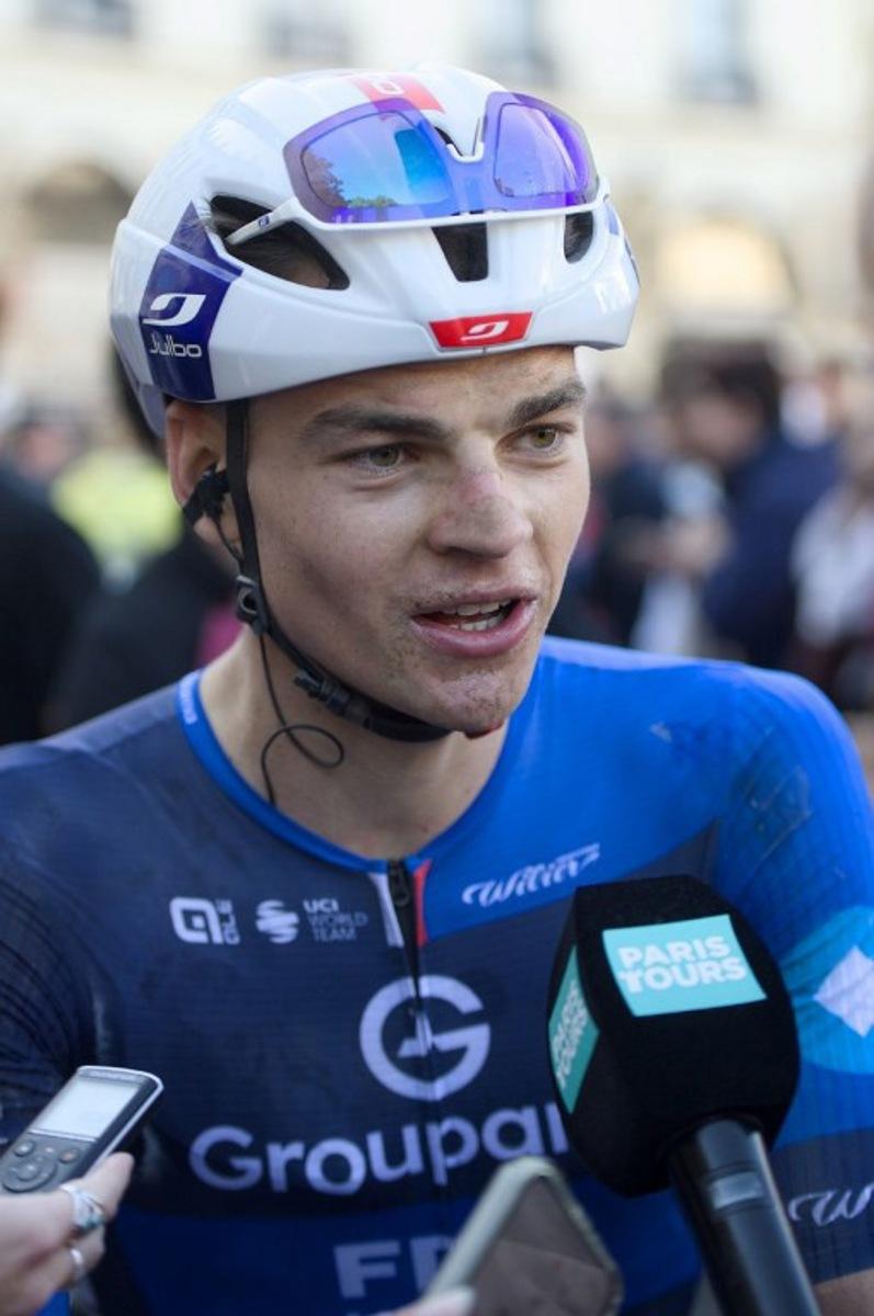 Groupama-FDJ team's French rider Thibaud Gruel delivers remarks to media after the 119th edition of the 211,6 km Paris-Tours one day cycling race, in Tours, central France on October 12, 2025. GUILLAUME SOUVANT / AFP
