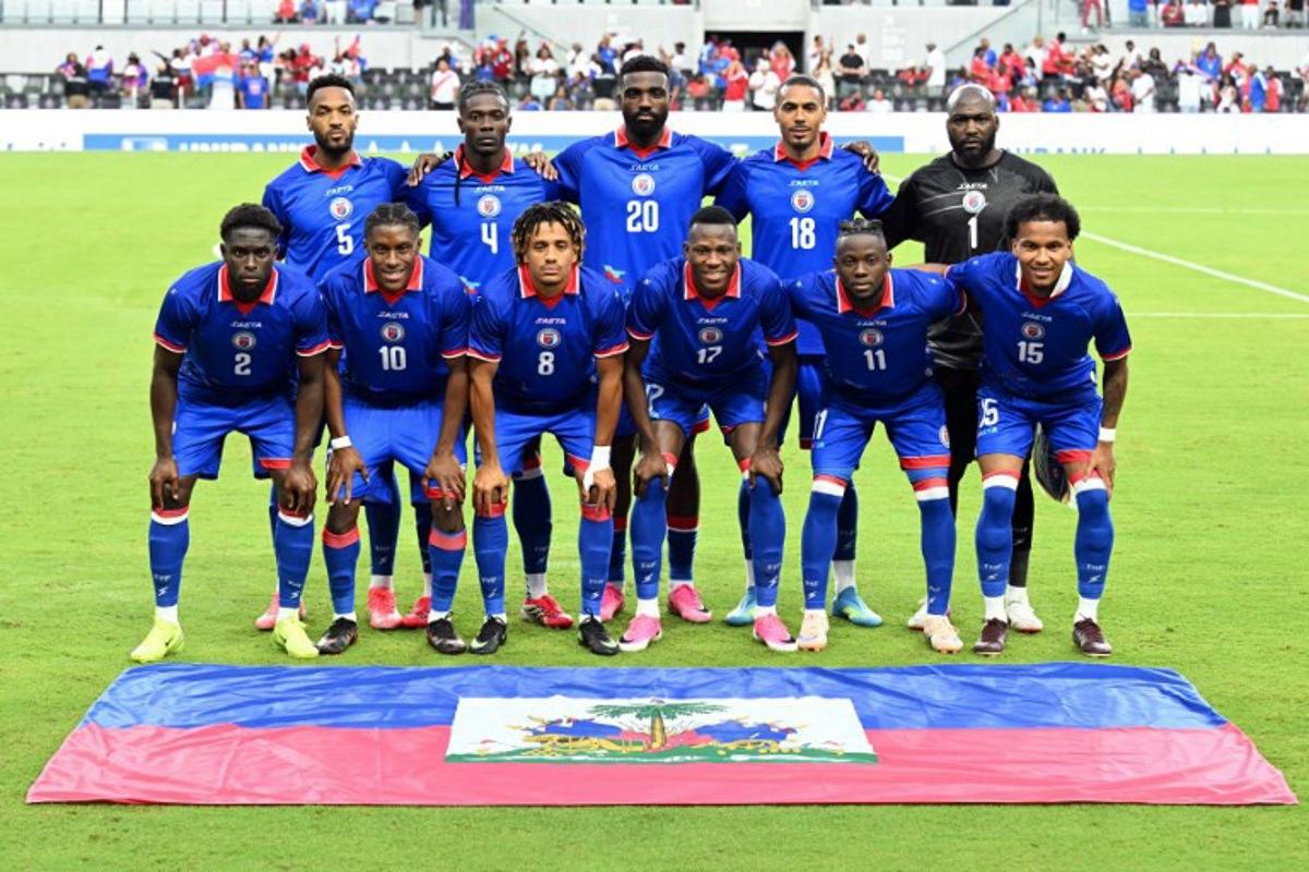 The Haiti national team pose for a photo before the start of an international friendly football match between Haiti and Peru at Nu Stadium in Miami, Florida on June 5, 2026. CHANDAN KHANNA / AFP
