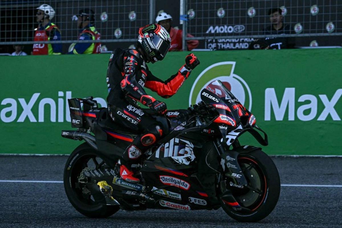 Aprilia Racing's Italian rider Marco Bezzecchi celebrates his victory after crossing the finish line during the MotoGP Thailand Grand Prix at the Buriram International Circuit in Buriram on March 1, 2026. Lillian SUWANRUMPHA / AFP