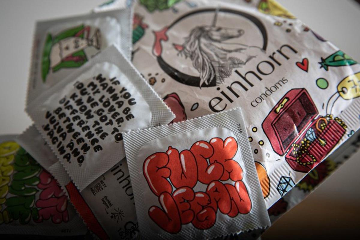 This photograph taken on April 25, 2023, in Courseulles-sur-Mer, shows packets of condoms. Lou BENOIST / AFP